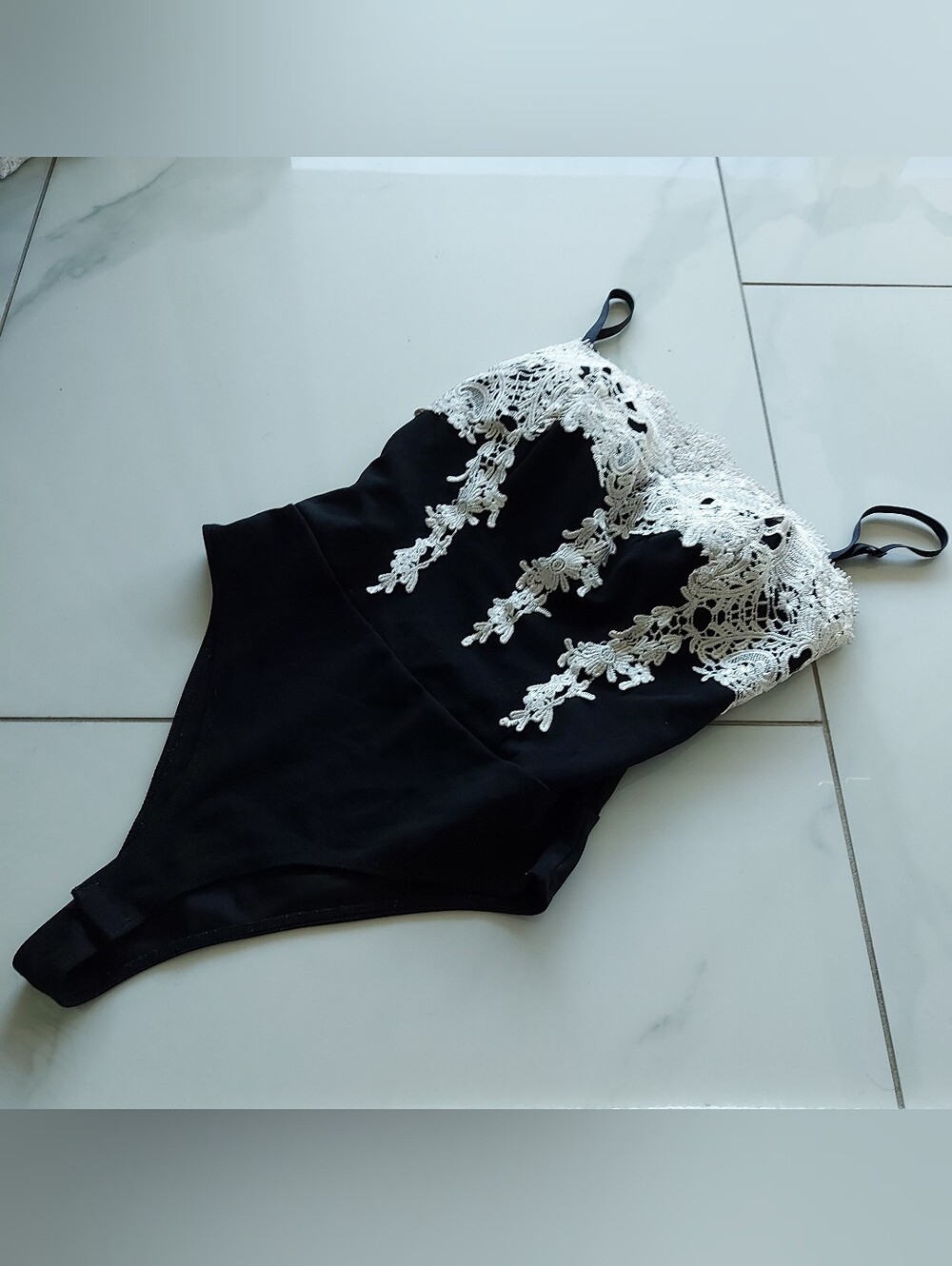Haute Monde Black One-Piece Bodysuit with White Lace Trim